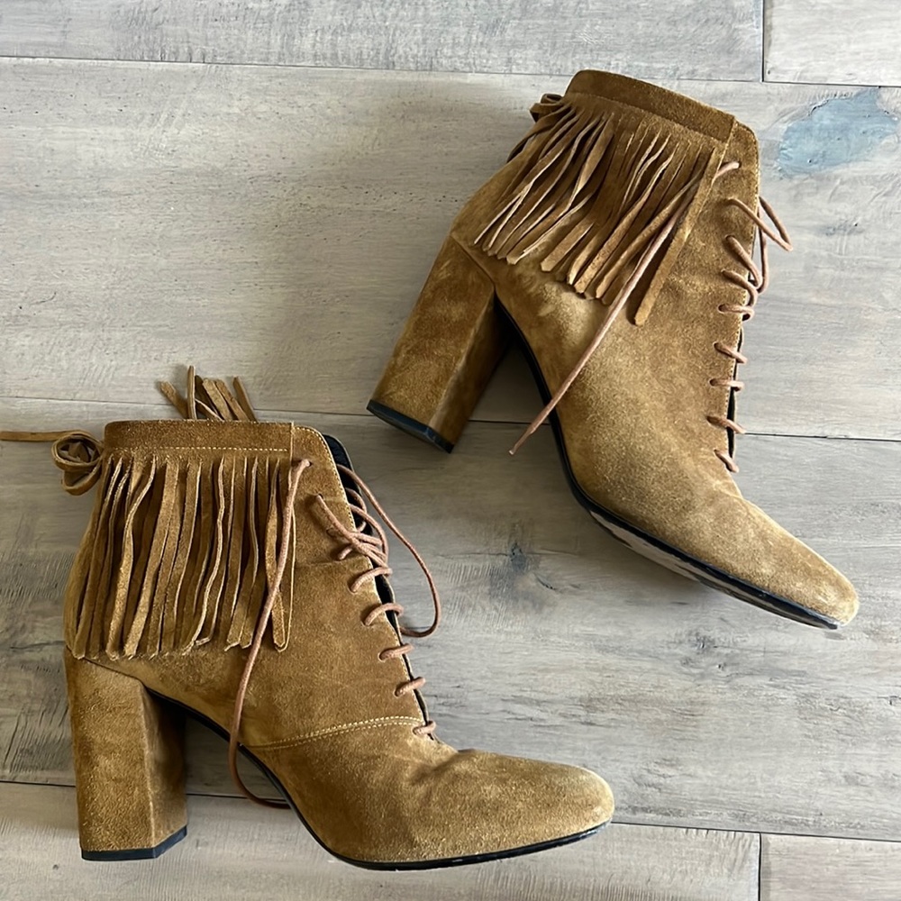 Saint Laurent size 40 boots with fringe detail.